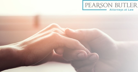 Hands holding each other