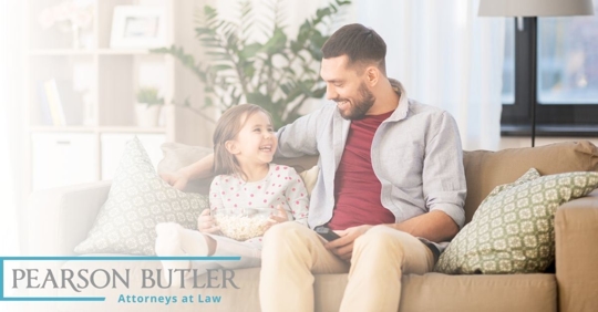 Father sitting down with his daughter