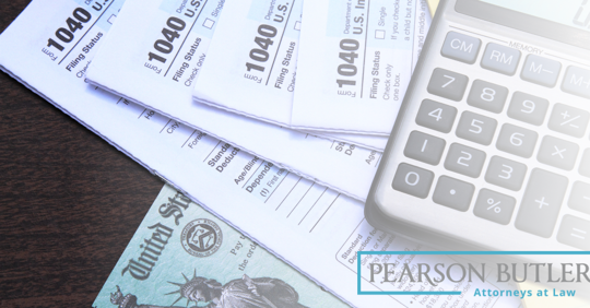 tax forms and a calculator