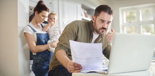 Family trying to fill out paperwork