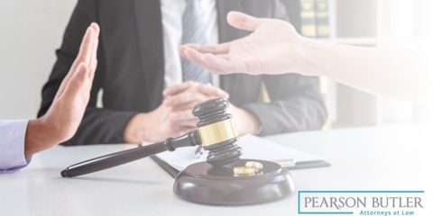 couple arguing in between an attorney