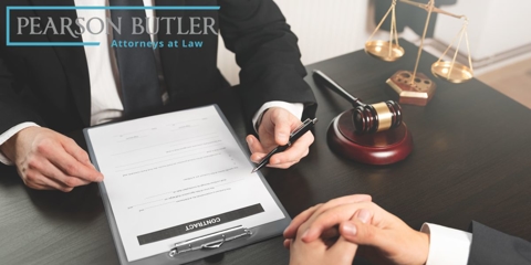 attorney and client looking at contract