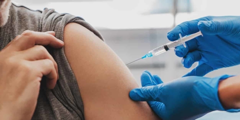 close up of patient receiving a vaccine