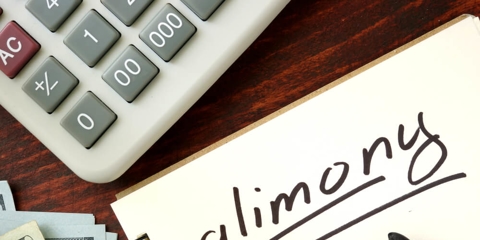 Alimony written on a notepad
