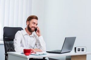 man looking at laptop